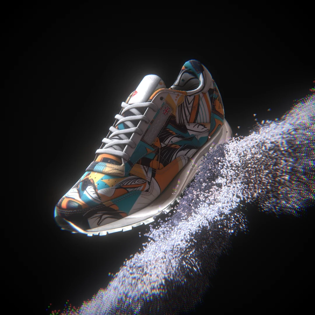 Reebok Classic sneaker with an illustrated teal and orange pattern and white laces